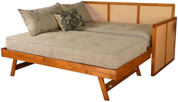 Wooden daybed with beige cushion and woven backrest on a white background