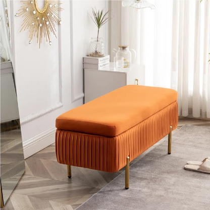 Orange upholstered bench in a room with decorative elements.