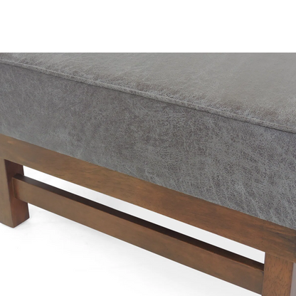 Gray cushioned bench with wooden frame on a white background