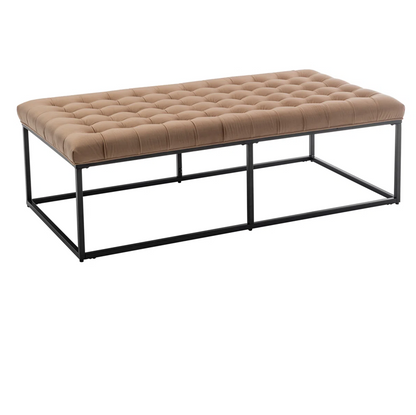 Beige tufted bench with black metal frame on a white background