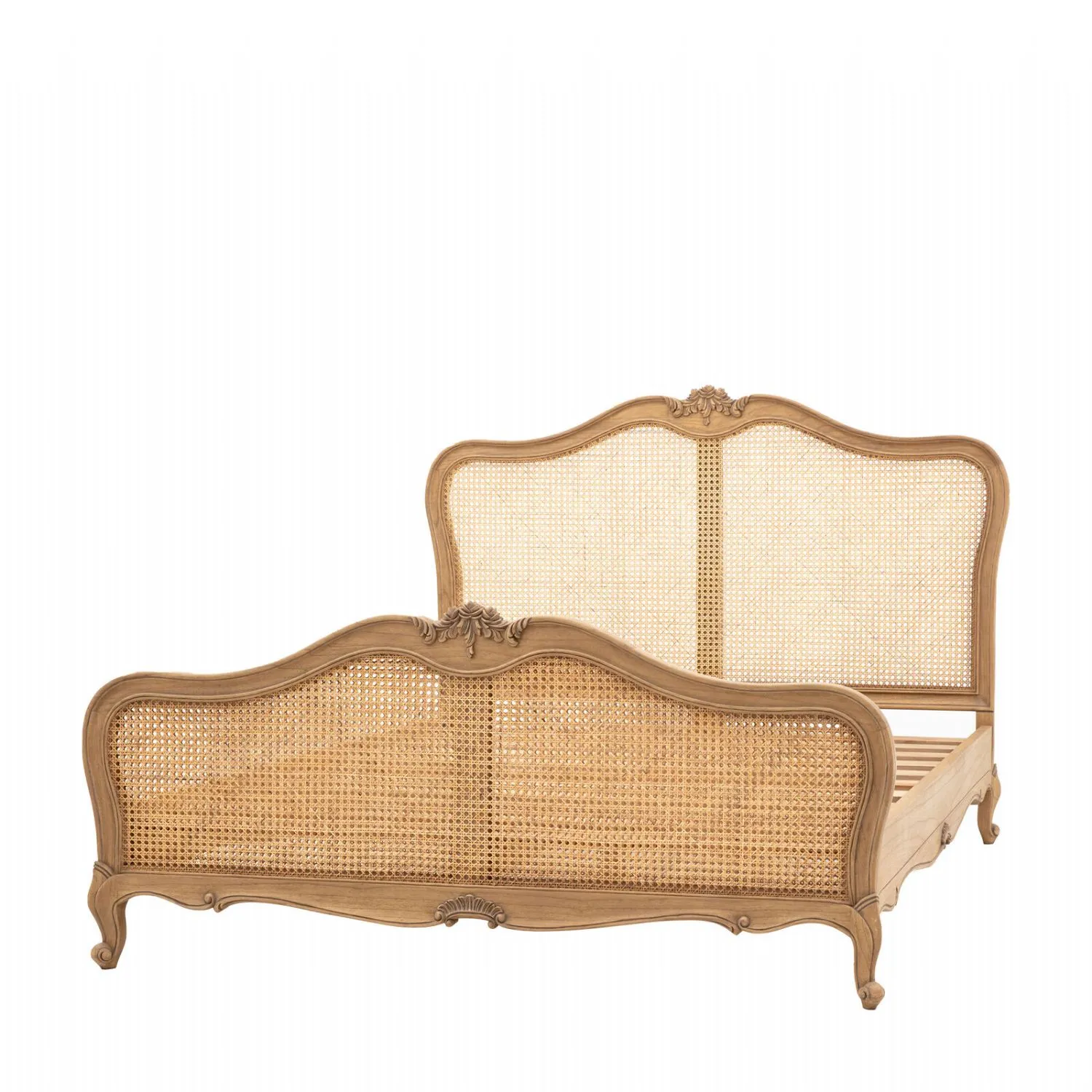 Vintage-style bed with wicker headboard and footboard on a white background