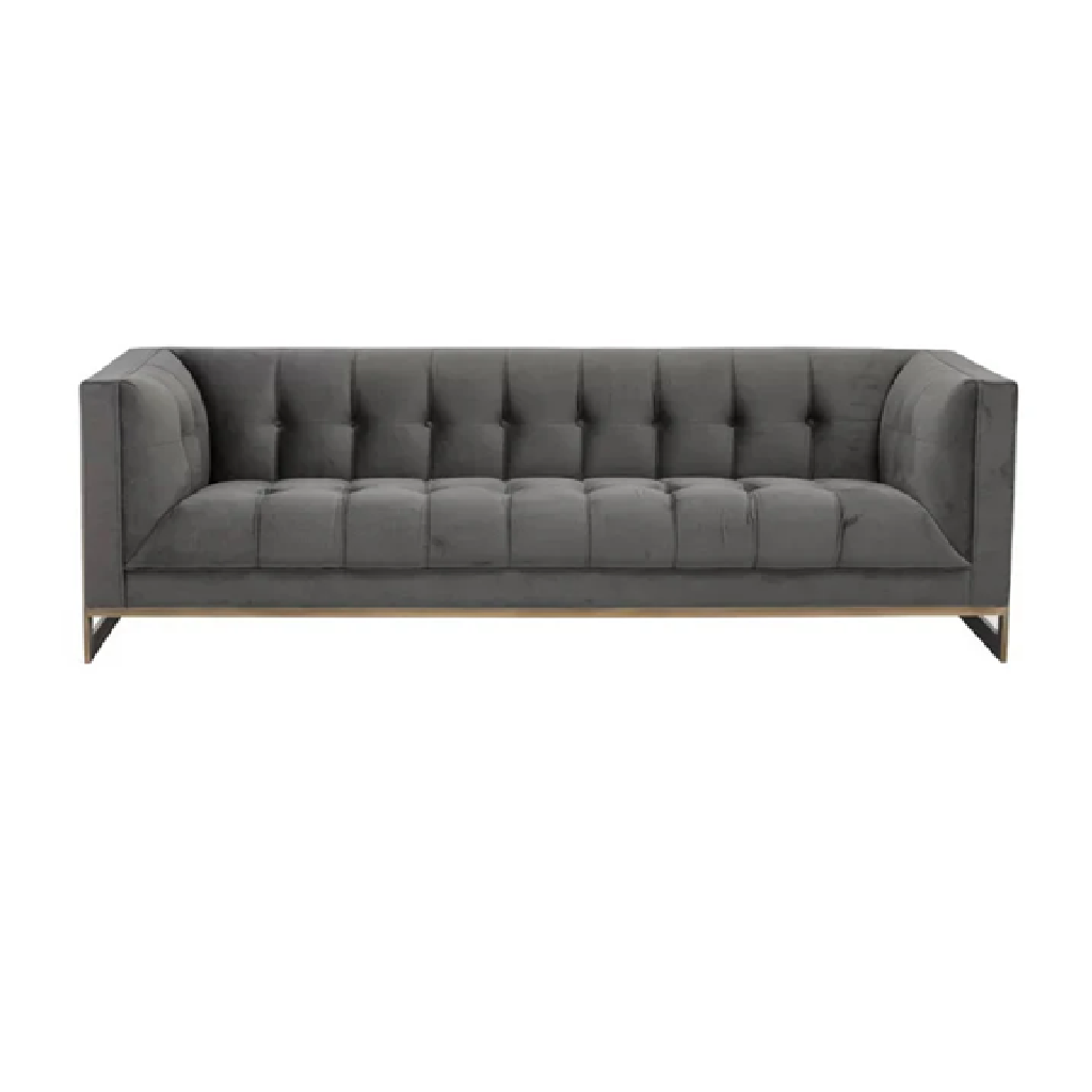 Gray tufted sofa on a white background