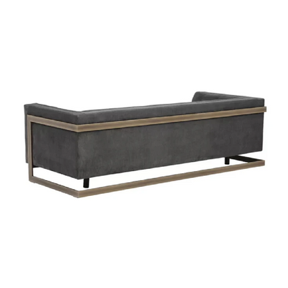 Gray sofa with bronze frame on a white background