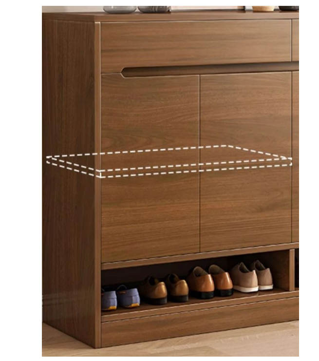 Wooden shoe cabinet with shoes inside on a white background