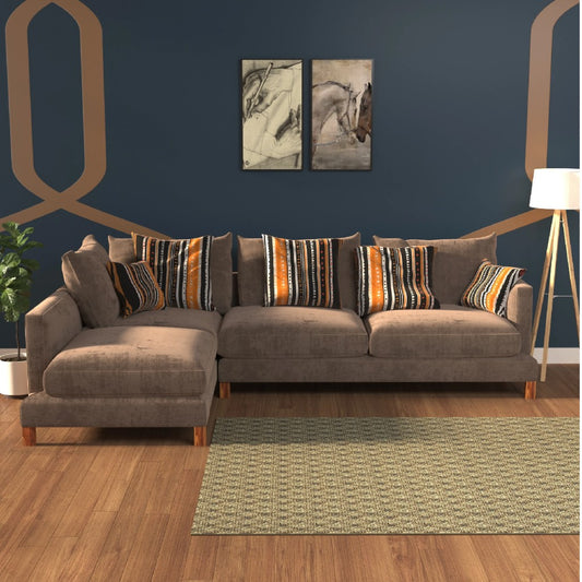 Brown sectional sofa with patterned cushions in a living room setting.