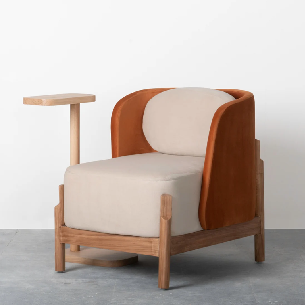 Chair with brown and beige design on a gray floor and white wall background