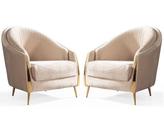 Pair of beige armchairs with gold legs on a white background