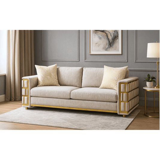 Beige sofa with gold frame in a living room setting