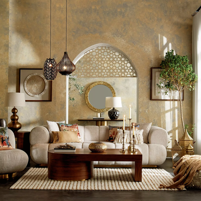 Living room with beige walls, a white sofa, wooden coffee table, and decorative elements.
