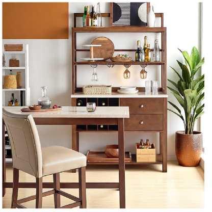 Dining room setup with wooden table, chairs, and shelves with decorative items.